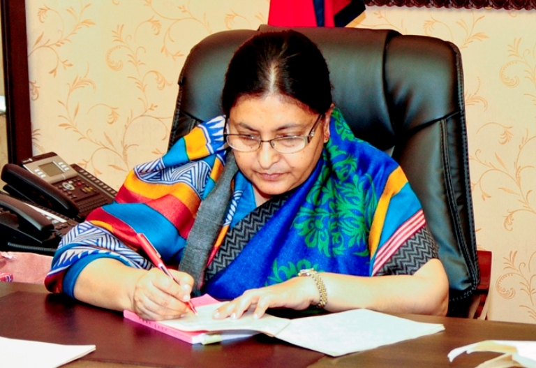President Bidya Devi Bhandari signs